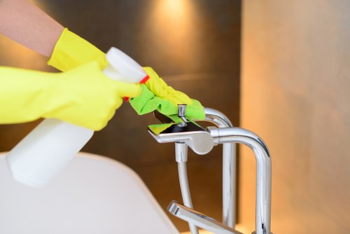 Disinfecting high-touch points in a communal building area