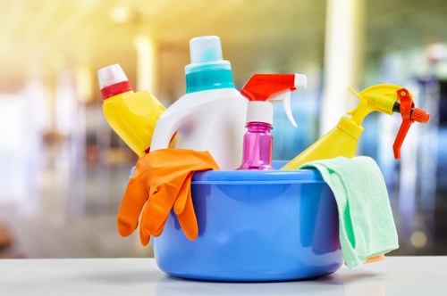 Kitchen surfaces being deep cleaned for grease and grime