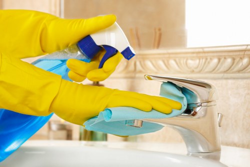 Deep cleaning kitchen surfaces during a Maida Vale service